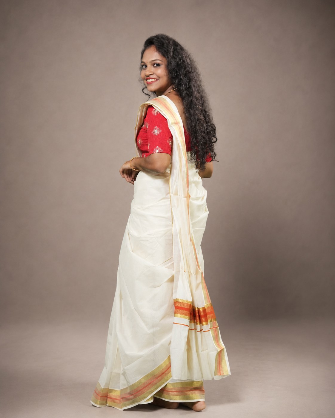 Enteloom Kerala Cotton Kasavu Saree In Orange And Golden Border